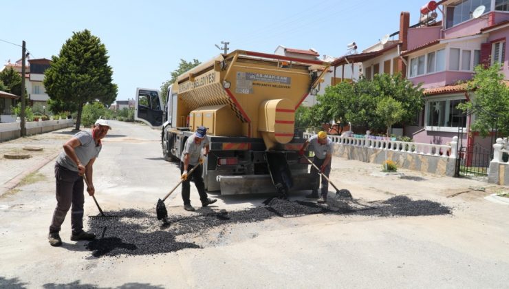 Burhaniye’de bozulan yollar asfaltlanıyor